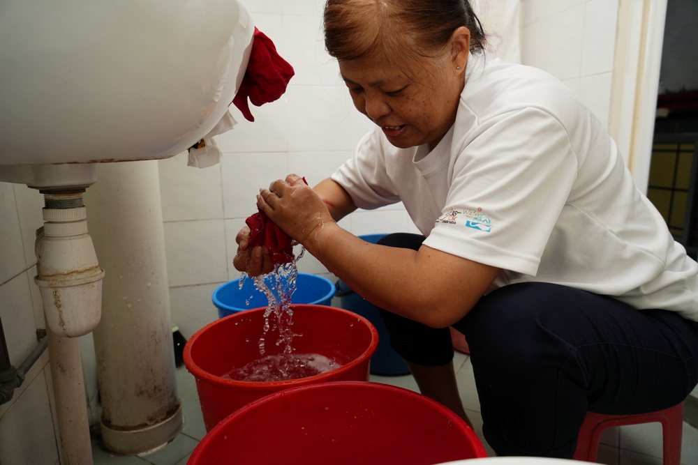 Ms Ng also tries to protect the environment through other means such as reusing laundry water for other purposes. (Photo by Chan May Ching)